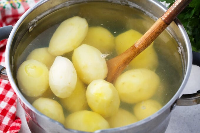 Boiling potatoes.