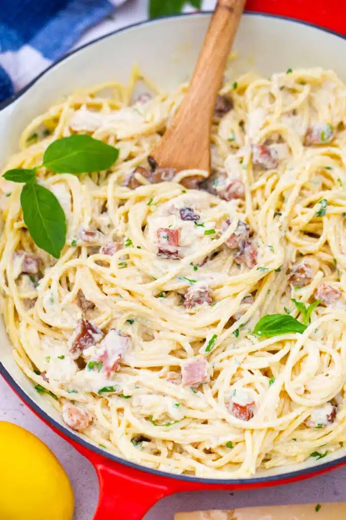 a skillet of homemade chicken carbonara with bacon