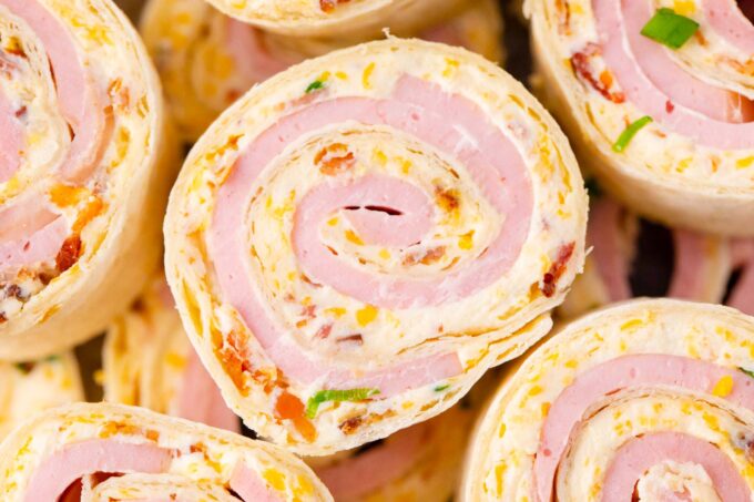 Crack turkey pinwheels.