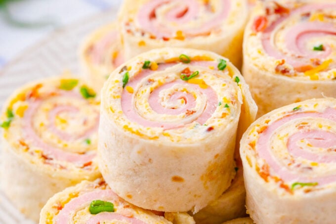 Homemade crack turkey pinwheels on a plate.