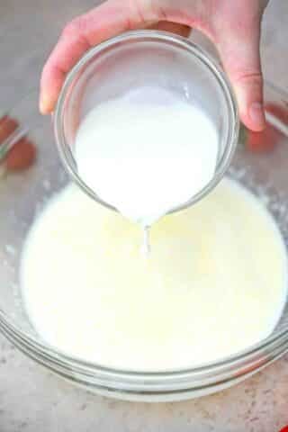 adding cream to milk mixture