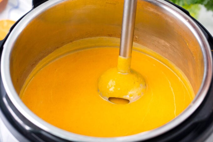 Blending Instant Pot Sweet Potato Soup.