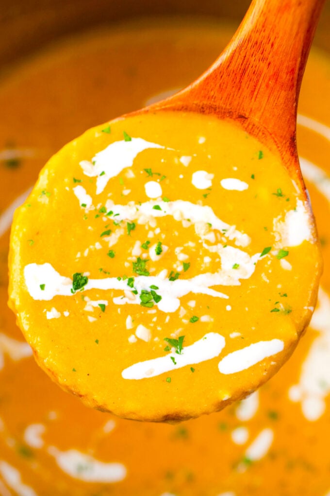A ladle of creamy Instant Pot Sweet Potato Soup.