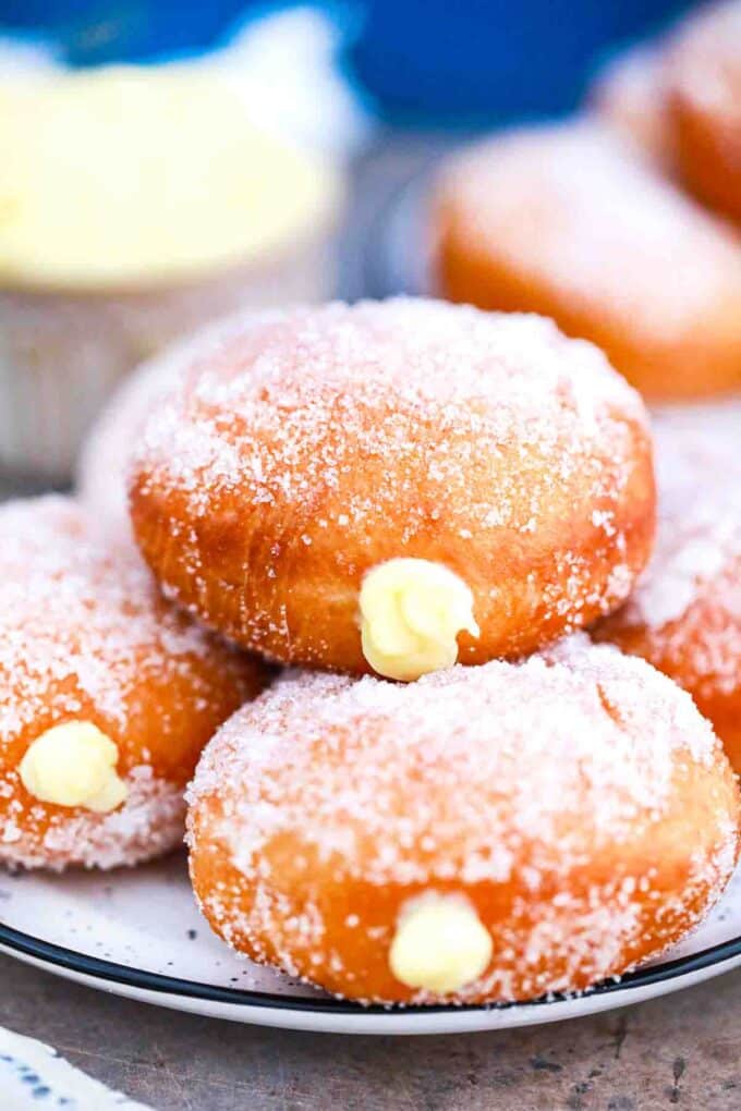 custard donuts stacked on top of each other