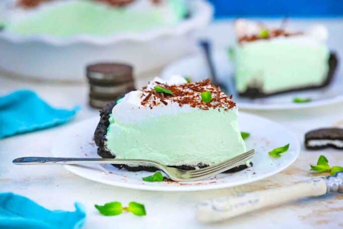 a slice of grasshopper pie topped with whipped cream