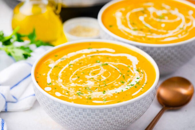 Bowls of smooth and creamy Instant Pot Sweet Potato Soup.