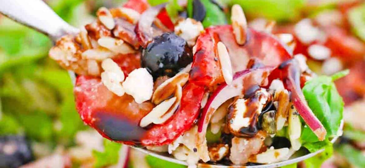 close shot of a spoonful of strawberry orzo spring salad