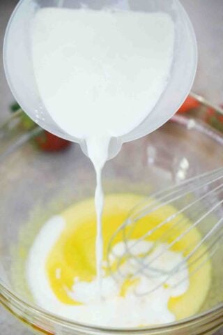 adding milk to melted butter