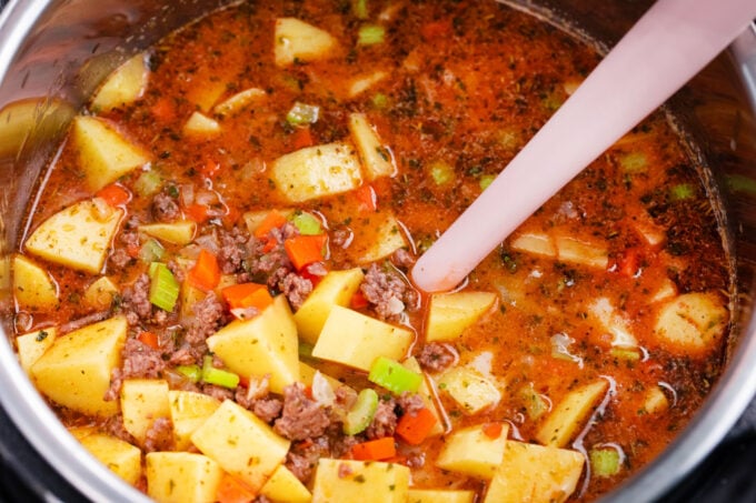 Pressure cooking Instant Pot cheeseburger soup.