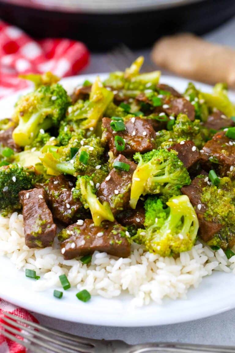 Instant Pot beef and broccoli served with a fluffy white rice.