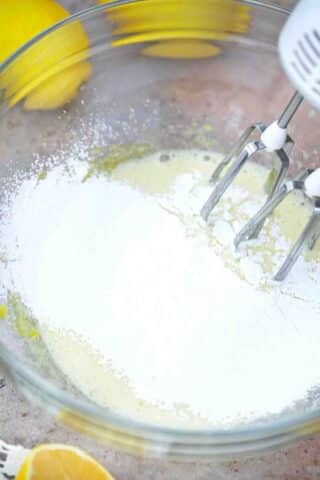 mixing flour and beaten eggs