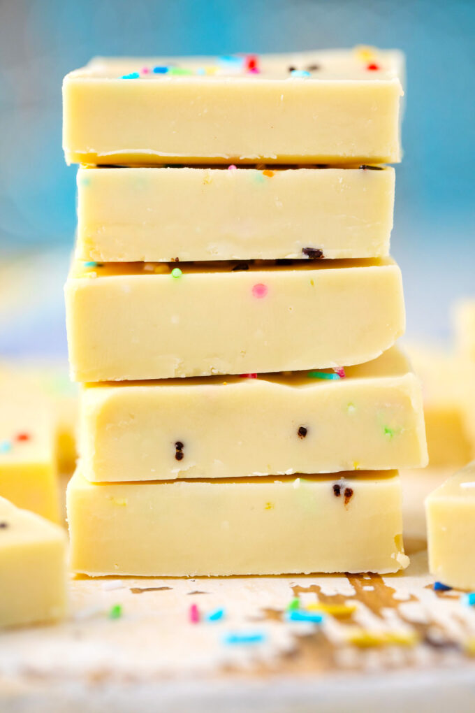 No bake white chocolate fudge squares on top of each other.