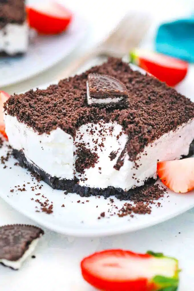 oreo dessert with a bite and strawberries for decor