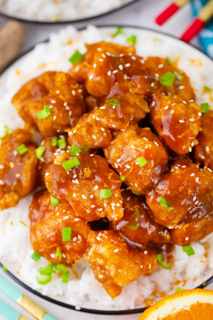 Asian orange chicken served on top of rice.