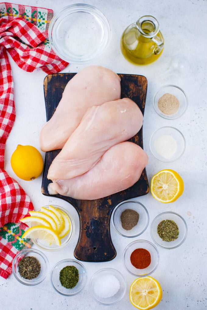 Overhead shot of Instant Pot chicken breasts ingredients on a table.