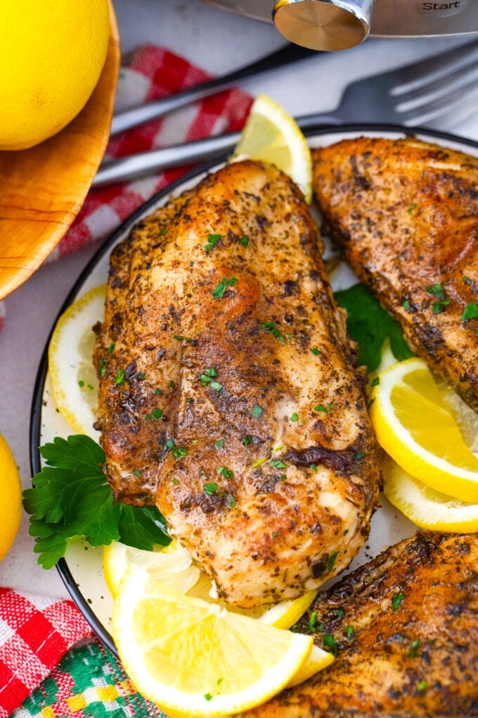 Juicy, herb seasoned Instant Pot chicken breasts.