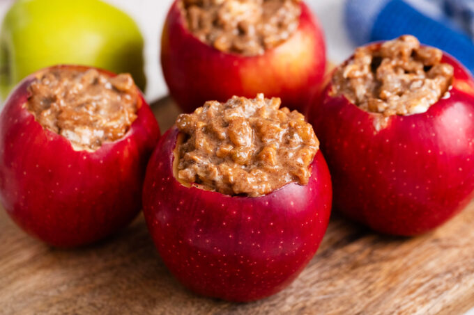 Stuffing apples with walnuts and raisins.