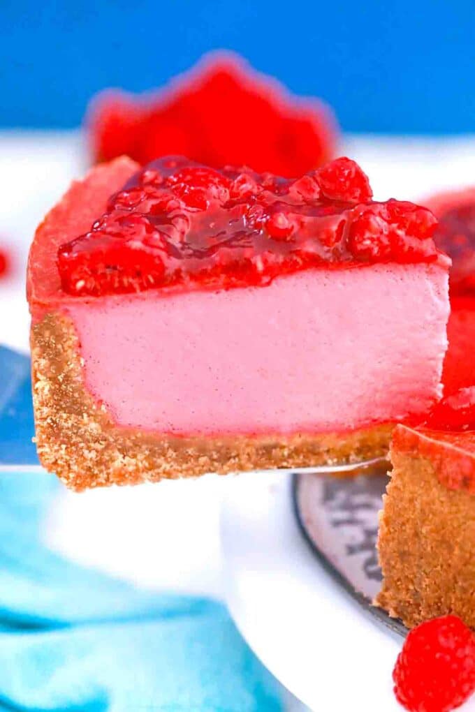 a slice of baked raspberry cheesecake