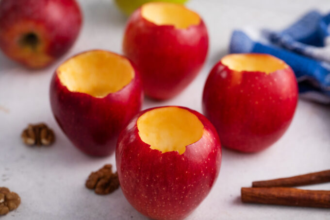 Removing the apple core to make space for filling.