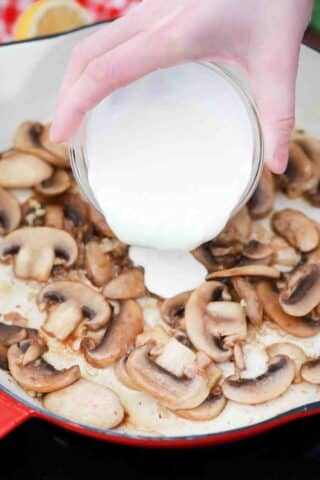 adding cream to make mushroom sauce