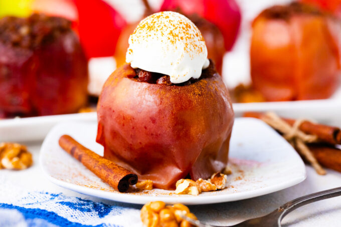 Tender Instant Pot baked apples served with ice cream.