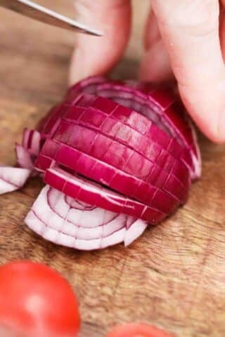 chopping a red onion
