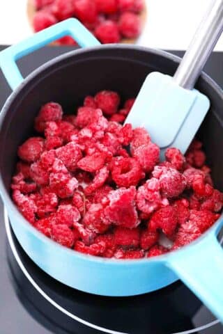 frozen strawberries in a saucepan