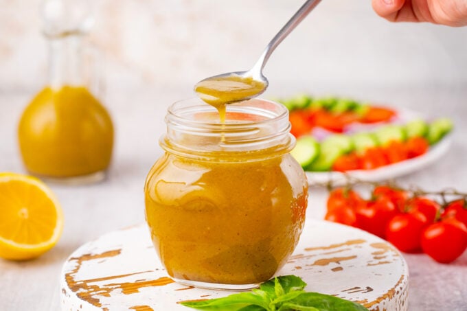 Greek salad dressing in a jar.