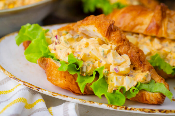 Croissants stuffed with homemade classic egg salad.