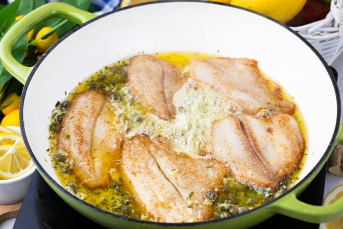 Swai fish fillets in lemon garlic sauce.