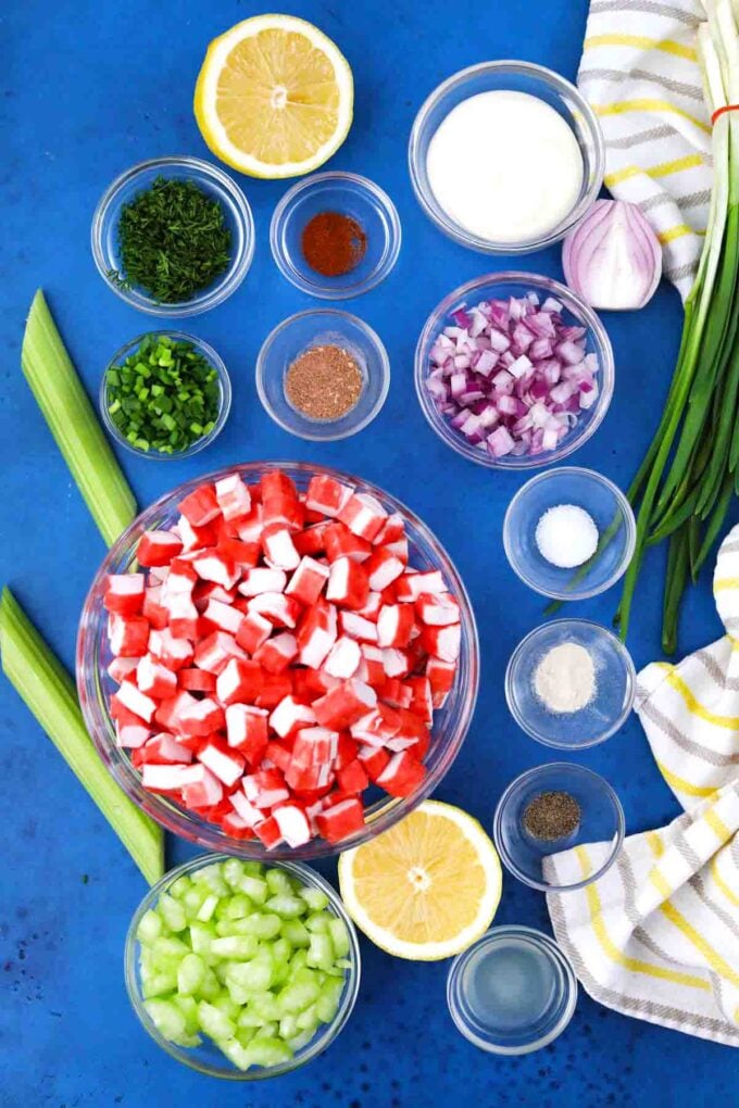 crab salad ingredients in bowls on a table