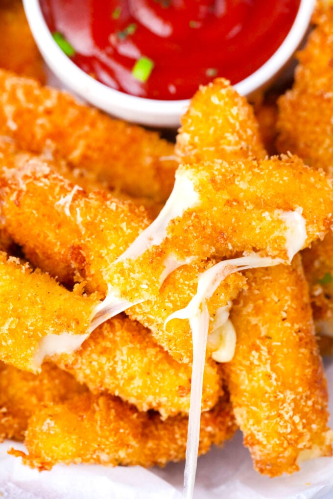 Cheesy and crispy fried cheese sticks.