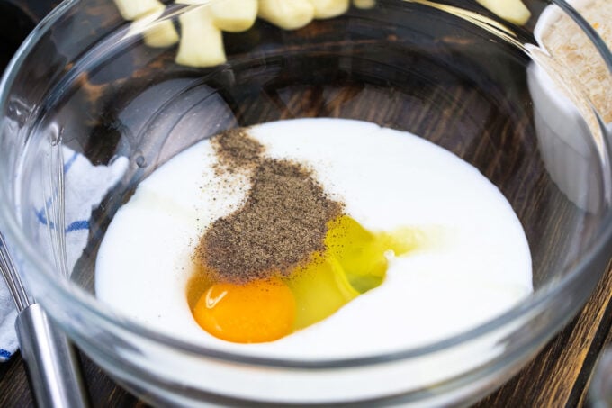 Egg and milk mixture in a bowl.