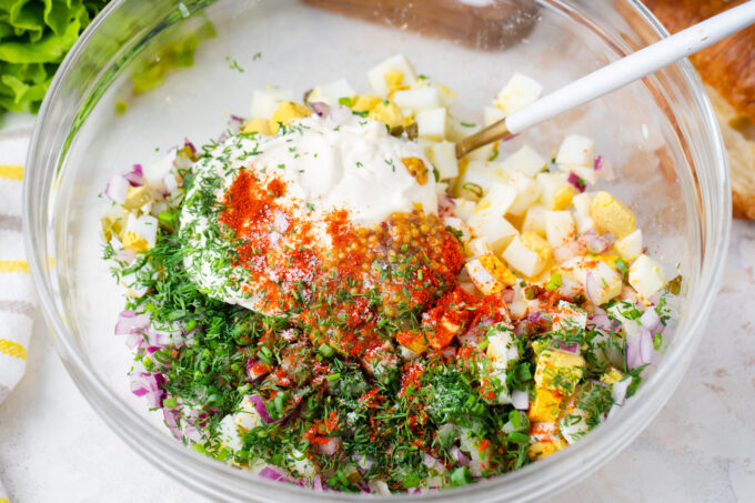 Homemade egg salad ingredients in a bowl.