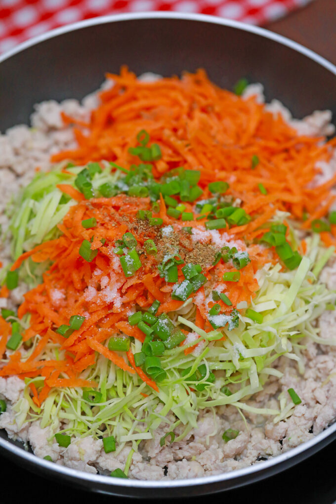 Panda Express chicken egg rolls filling with ground chicken, cabbage, carrots, and green onions.