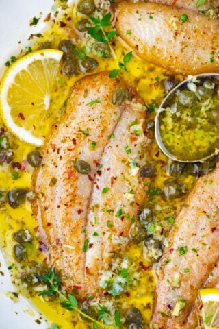 Close shot of lemon garlic butter swai fish.