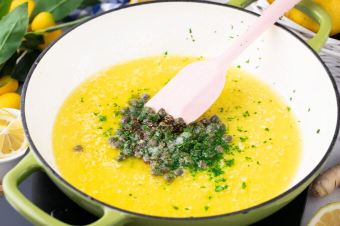 Making lemon garlic butter sauce.