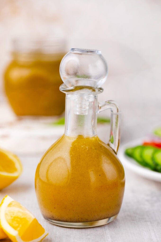 Greek salad dressing in a glass jar.