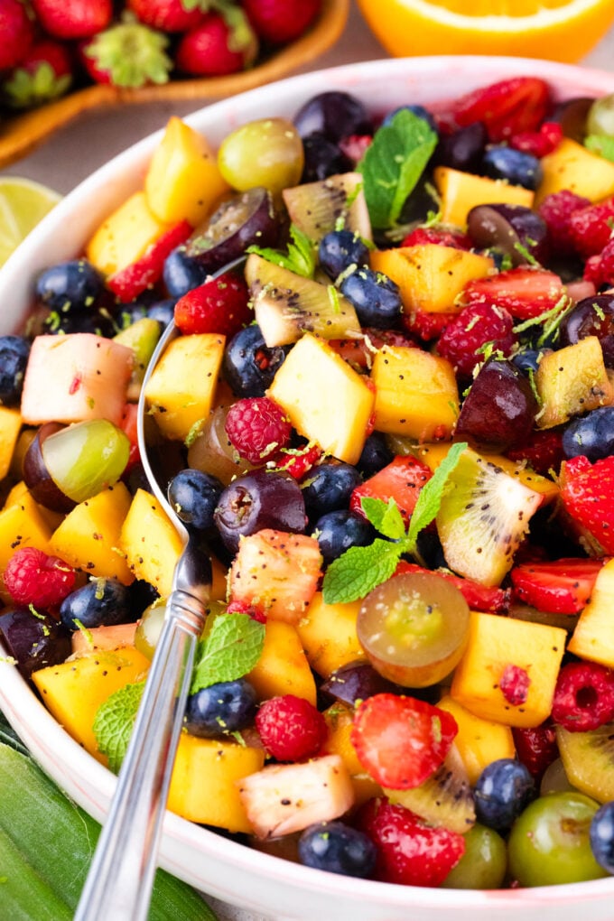 Juicy and colorful, rainbow fruit salad.