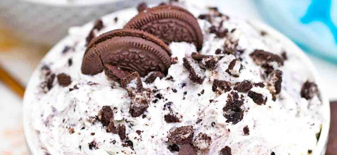 a bowl of homemade oreo fluff topped with oreo cookies
