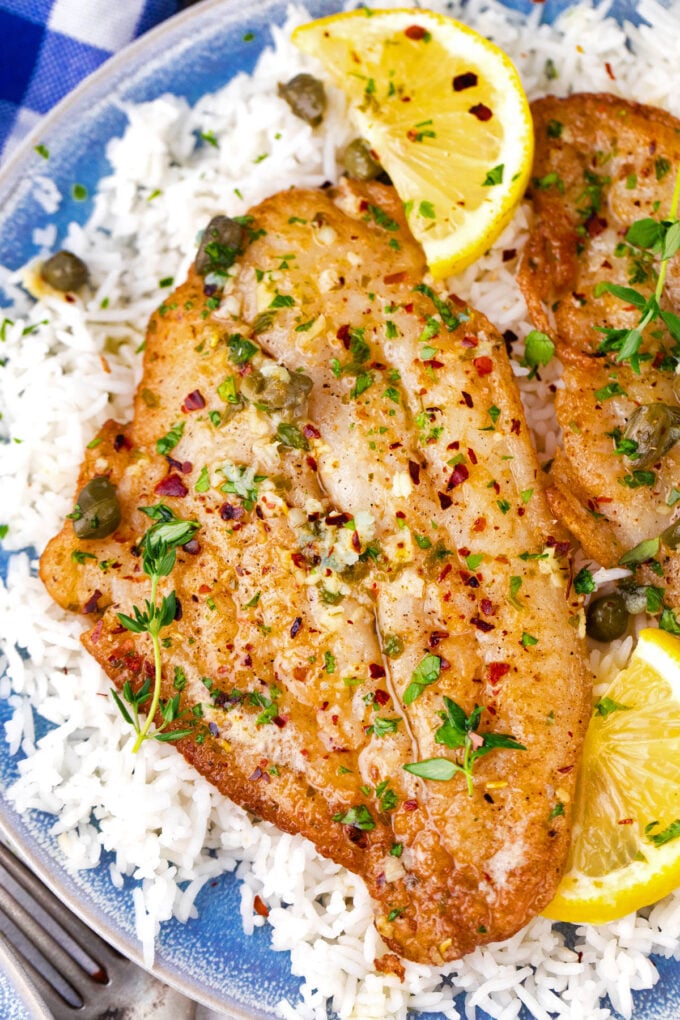 Flaky lemon garlic butter swai fish fillets with capers.