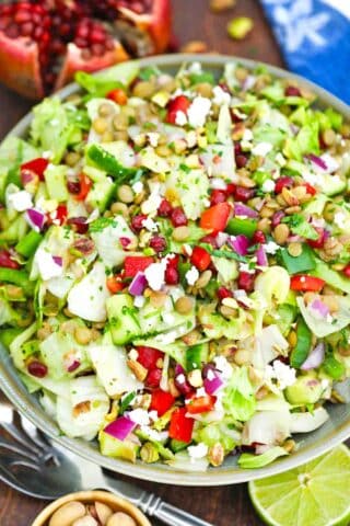 overhead shot of a bowl of chopped mediterranean lentil salad recipe