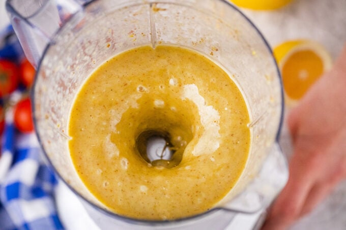 Blending Greek salad dressing.
