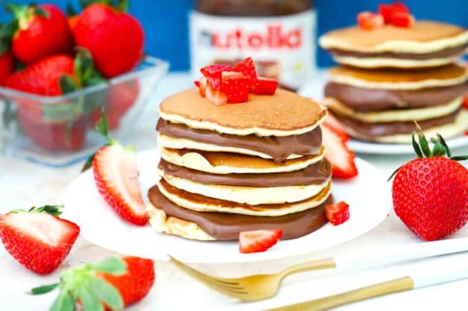 nutella pancake sandwiches topped with strawberries