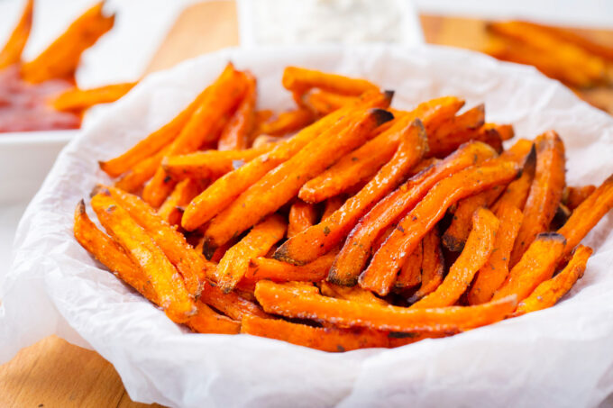 A bowl of crispy oven roasted sweet potato fries.
