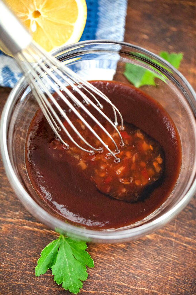 Mixing BBQ chili glaze.