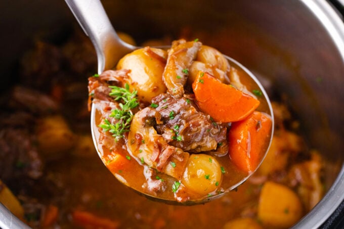 A ladle of Instant Pot beef stew.