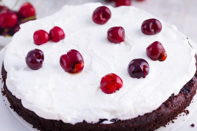 Assembling black forest cake.