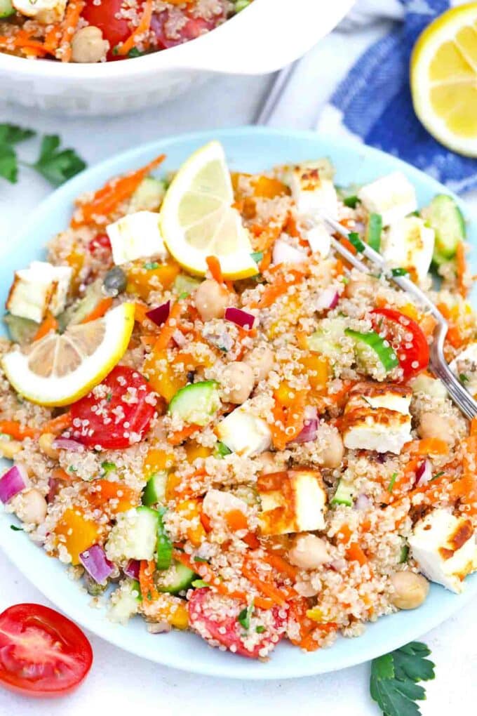 overhead shot of a plate of mediterranean grilled feta quinoa salad