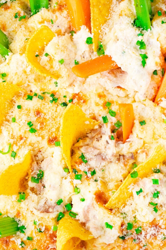 Close shot of creamy and cheesy chicken Caesar dip.